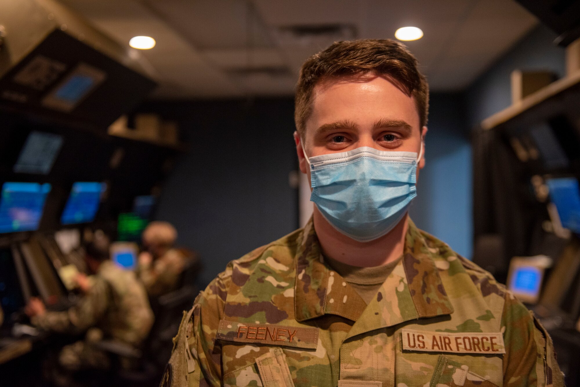 An Airman poses for a photo