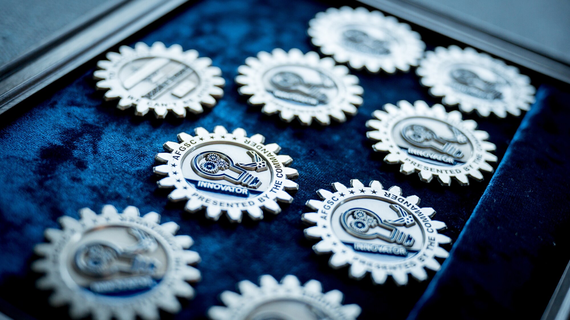 Photo detail of AFGSC coins.