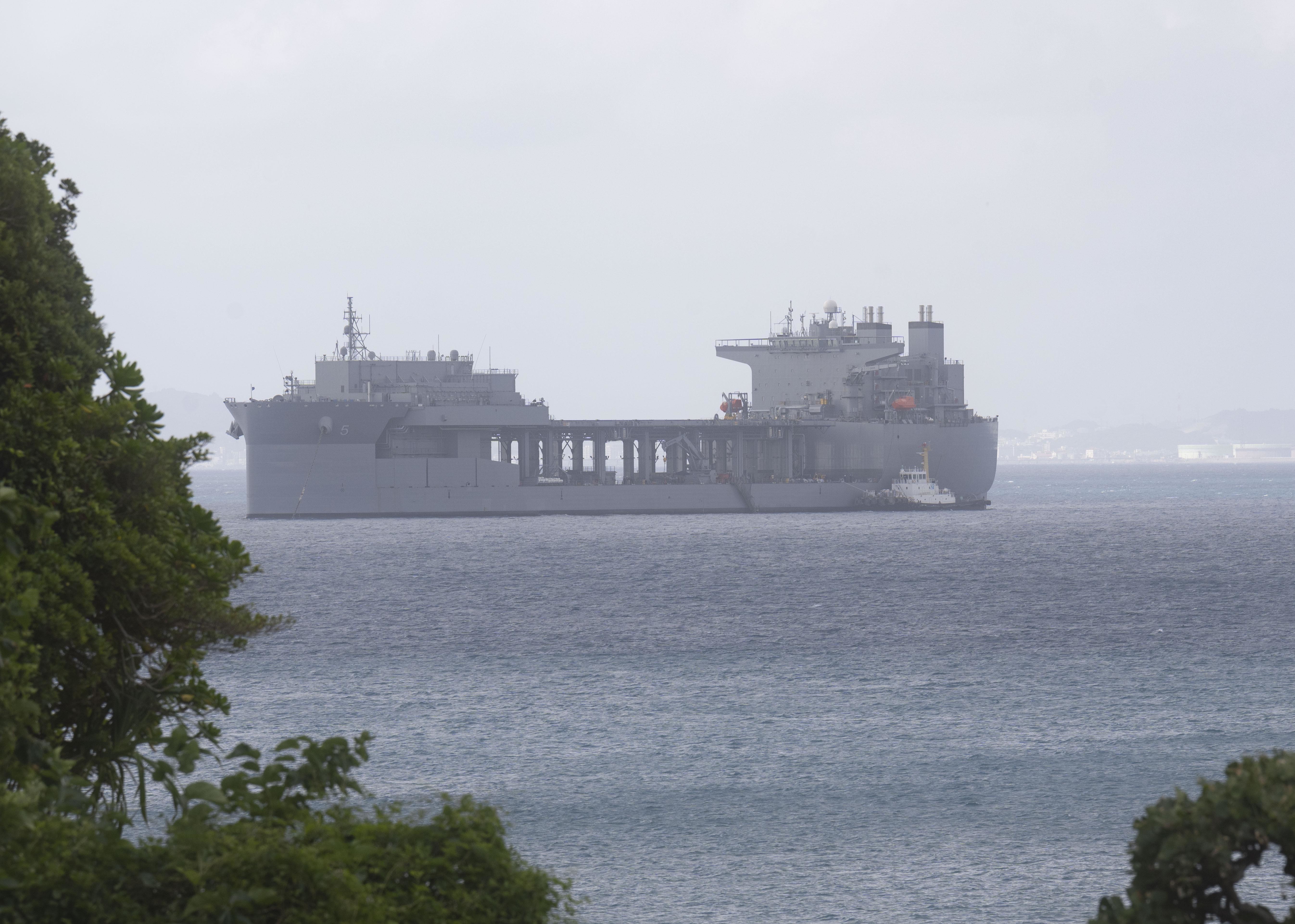 WHITE BEACH, Japan (Oct. 6, 2021) Lewis B. Puller-class expeditionary staging base USS Miguel Keith (ESB 5) anchors off Commander, Fleet Activities Okinawa White Beach Naval Facility Oct. 6, 2021. Miguel Keith, assigned to Amphibious Squadron Eleven, is operating in the U.S. 7th Fleet area of responsibility to enhance interoperability with allies and partners and serve as a ready response force to defend peace and stability in the Indo-Pacific region (U.S. Navy photo by Mass Communication Specialist 2nd Class Jessica Ann Hattell)