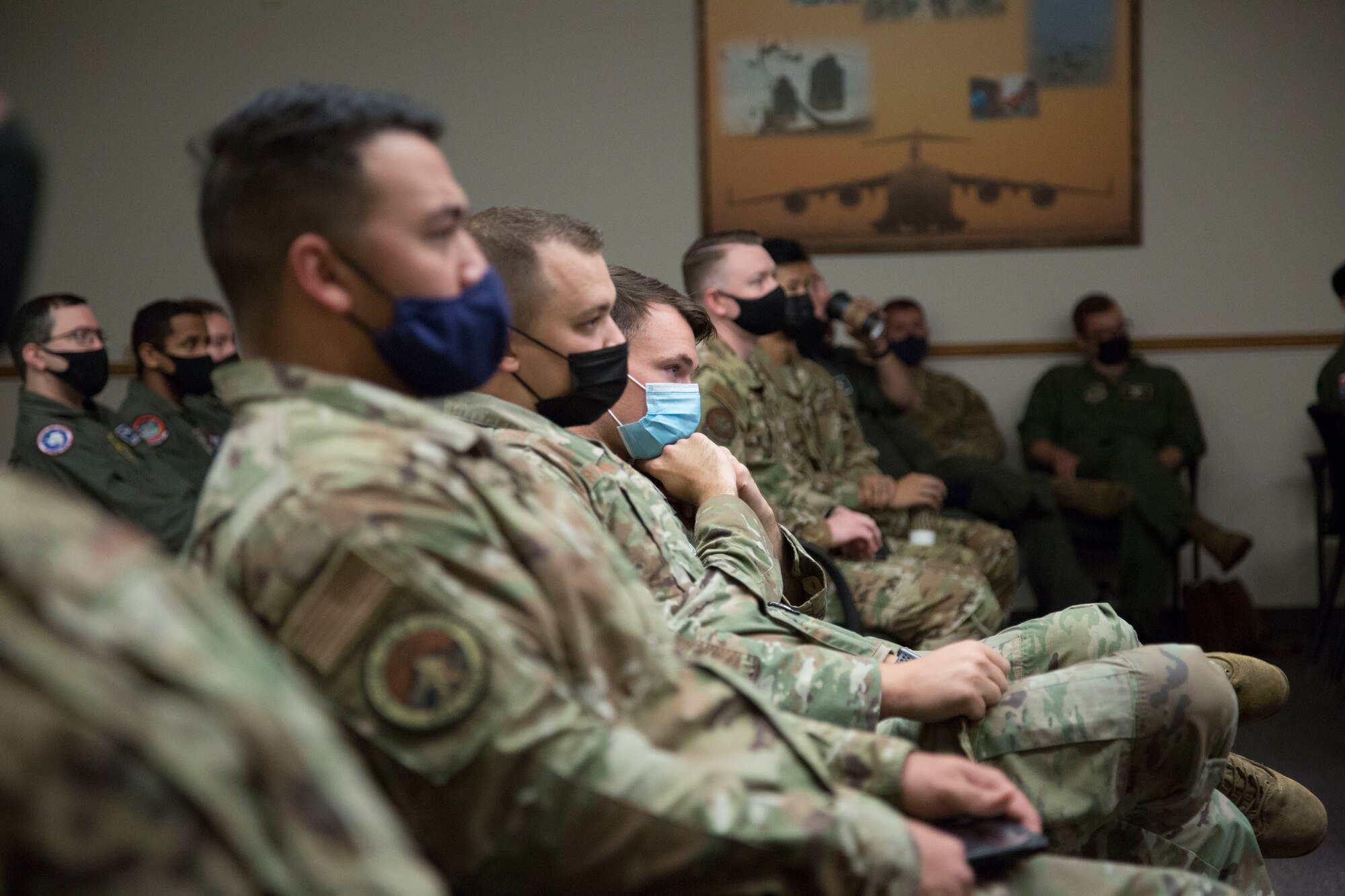 Airmen sitting in an auditorium