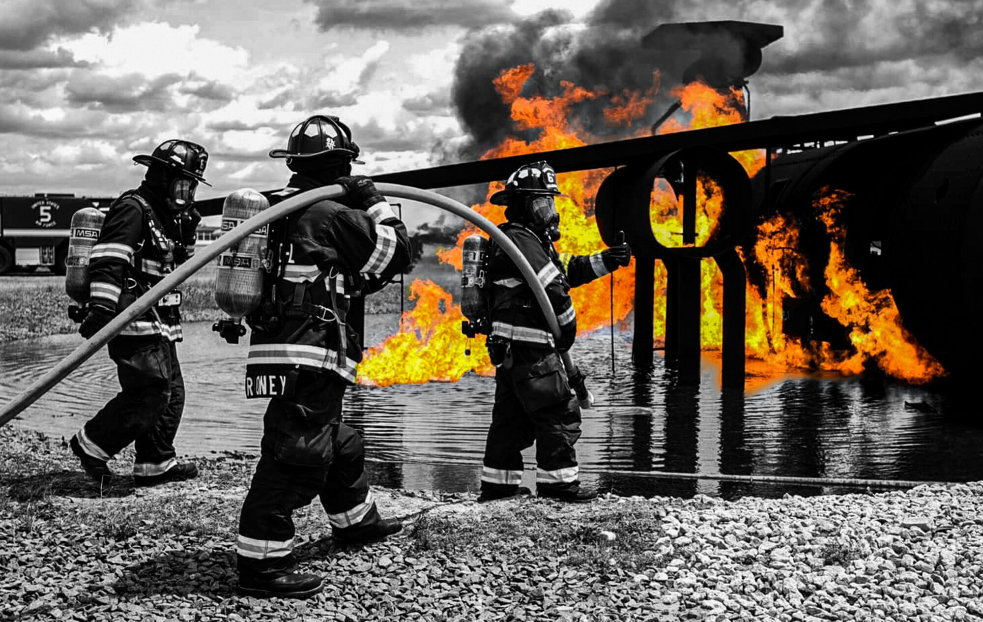 Firemen with the 87th Civil Engineering Squadron prepare to extinguish a controlled burn during Fire Prevention Week, Oct. 5, 2020, at Joint Base MDL, N.J. Fire Prevention Week is observed each year during the week of October 9th in commemoration of the Great Chicago Fire, which began on October 8, 1871. (Illustration courtesy of the 87th Civil Engineering Squadron Fire Department)