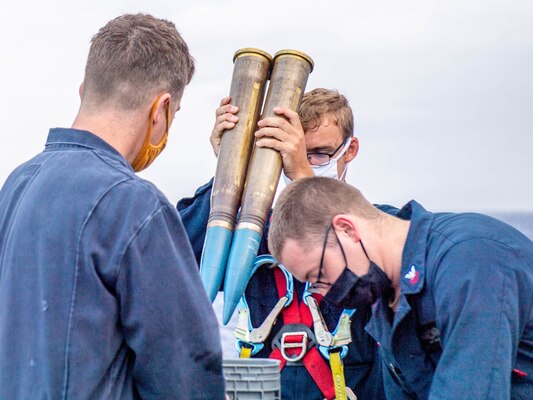 Sailors transfer Mark 137s aboard Independence-variant littoral combat ship USS Charleston (LCS 18).