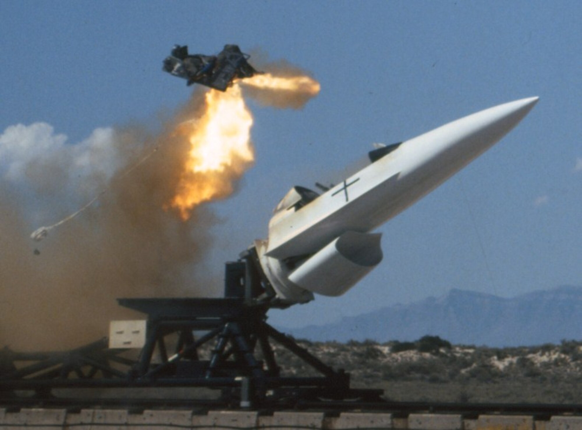 Holloman High Speed Test Track personnel conduct an ejection test at Holloman Air Force Base, New Mexico. Ejection testing is among the wide of array of testing at the HHSTT, which is operated by the 846th Test Squadron, a unit of the 704th Test Group of the Arnold Engineering Development Complex, headquartered at Arnold Air Force Base, Tenn. Personnel in the 846 TS are currently exploring the modernization of the test track, now in its eighth decade of existence, to extend its lifespan and further aid in the development of hypersonic systems. (U.S. Air Force photo)