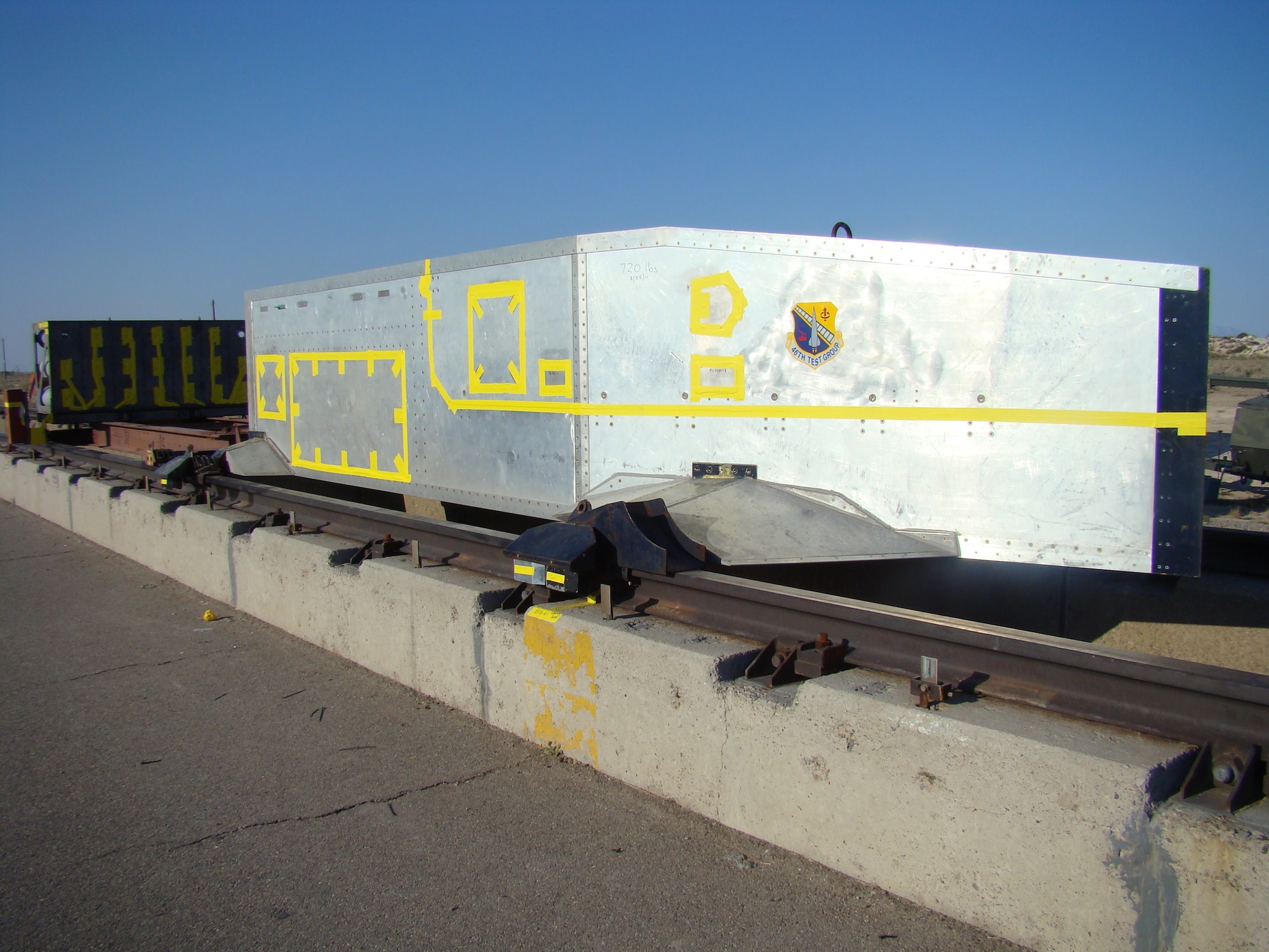 A guidance and navigation test article sits on the Holloman High Speed Test Track for launch at Holloman Air Force Base, New Mexico. The HHSTT is operated by the 846th Test Squadron, a unit of the 704th Test Group of the Arnold Engineering Development Complex, headquartered at Arnold Air Force Base, Tenn. Personnel in the 846 TS are currently exploring the modernization of test track to extend its lifespan and further aid in the development of hypersonic systems. (U.S. Air Force photo)