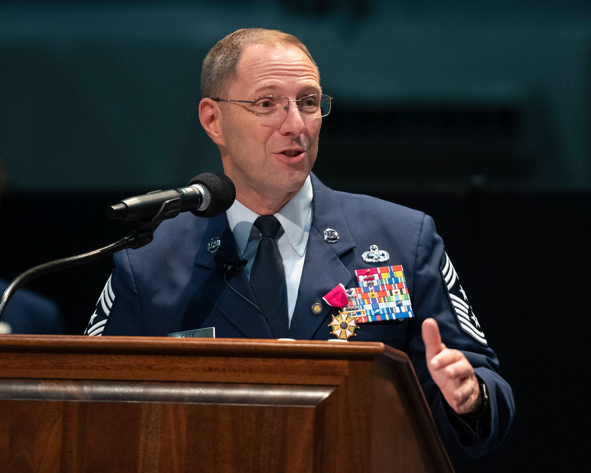 Chief Master Sgt. Stanley Cadell, Air Force Materiel Command command chief, delivers parting remarks during his retirement ceremony Oct. 1, 2021, at Wright-Patterson Air Force Base, Ohio. Cadell retired after 30 years on active duty. (U.S. Air Force photo by R.J. Oriez)