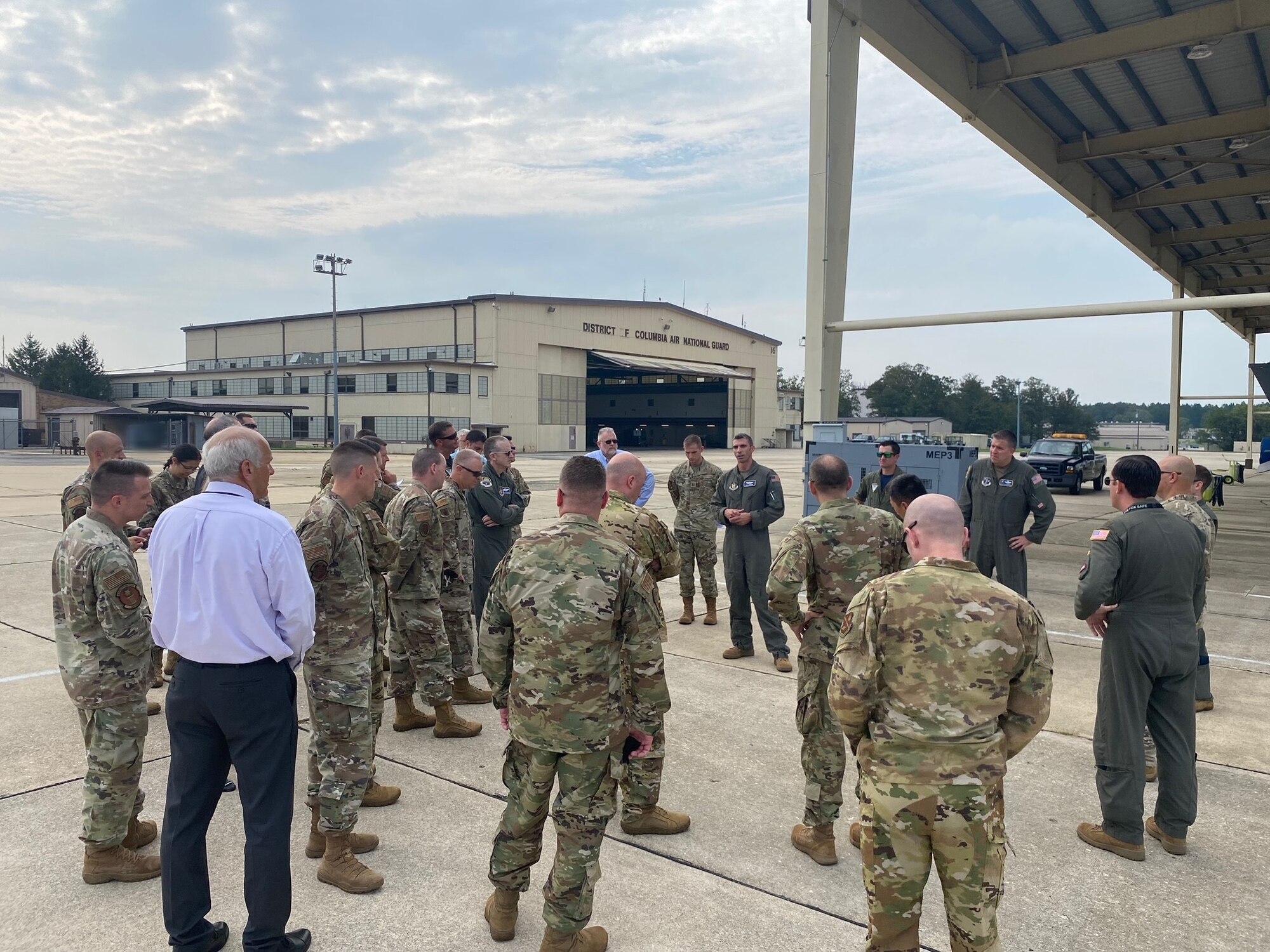 Senior leaders learn about airfield activities and projects during the first Senior Leader Airfield Tour (SLAT) at Joint Base Andrews, Md., Aug. 26, 2021.