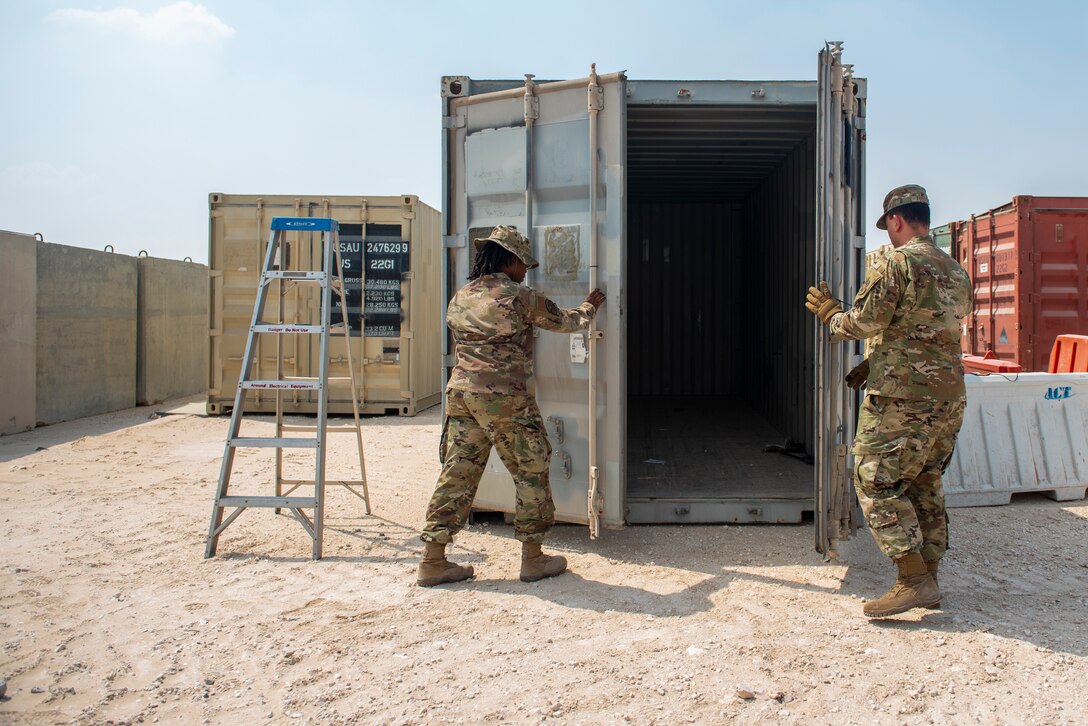 Checking serviceability ensures the safety of military assets during transit and that the container is ready for shipping by airlift or sealift. (U.S. Air Force photo by Senior Airman Kylie Barrow)