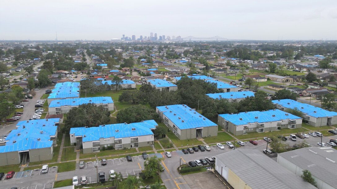 Aerial footage showing U.S. Army Corps of Engineers' installation of temporary, fiber-reinforced plastic sheeting, "blue roofs," on homes damaged by Hurricane Ida, Gretna, Louisiana. (Photo courtesy of USACE contractor)