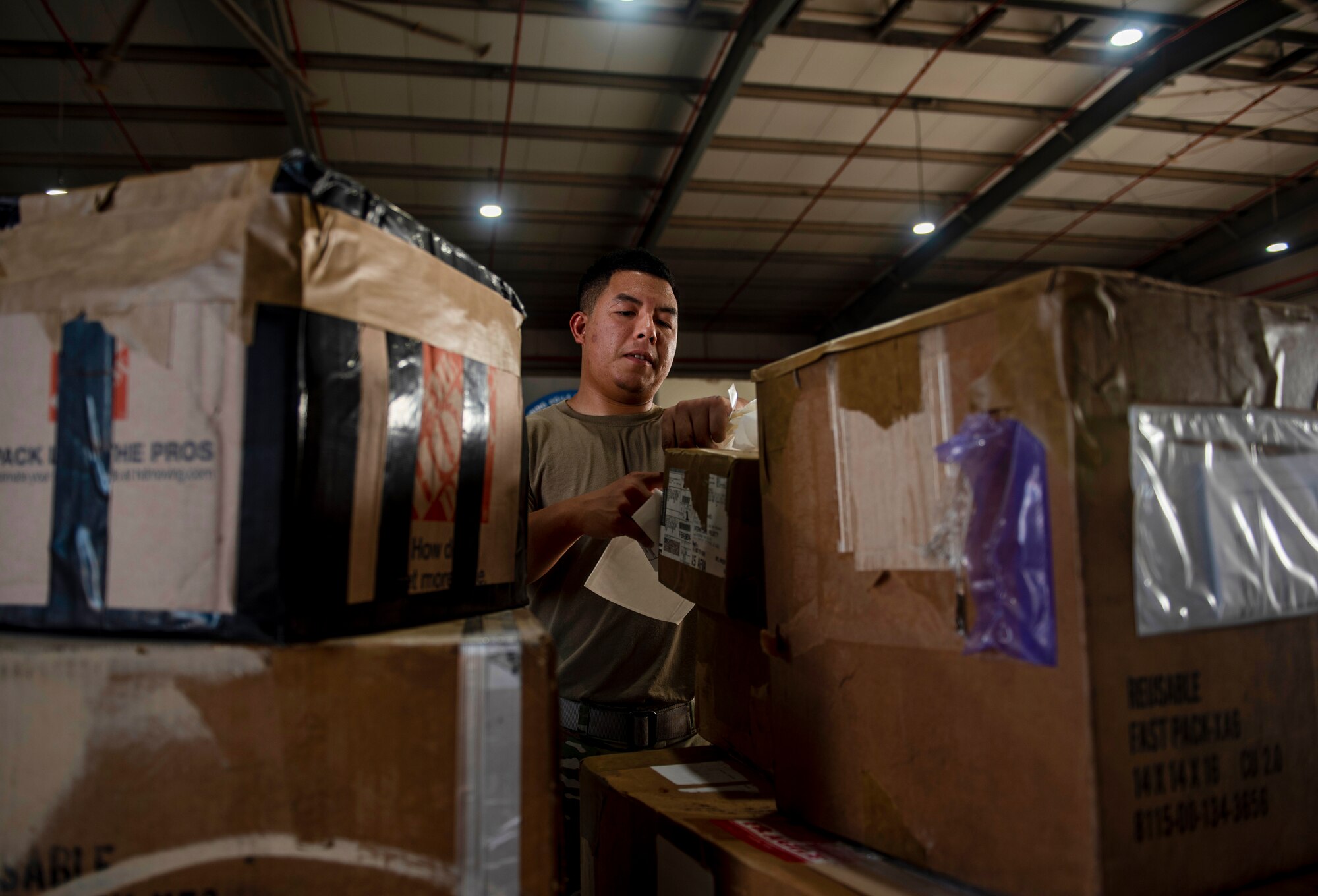 The Traffic Management Office outbound section ships all assets for AUAB including military working dogs, blood shipments, classified cargo and weapons. (U.S. Air Force Photo by Senior Airman Kylie Barrow)