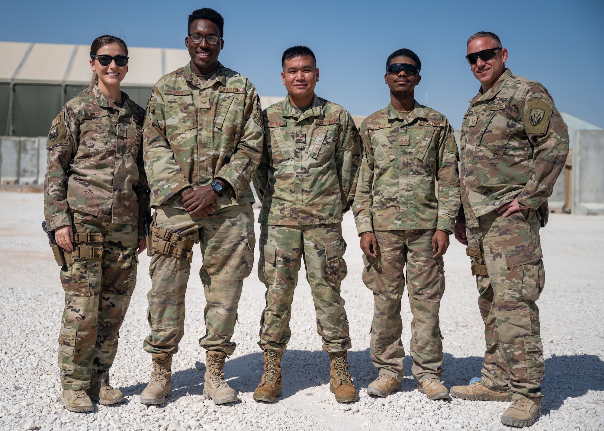 Joint Expeditionary Tasked/Individual Augmentees members for the Special Operations Forces Logistics Element pose for a group photo at Al Asad Air Base, Iraq, Sept. 25, 2021.