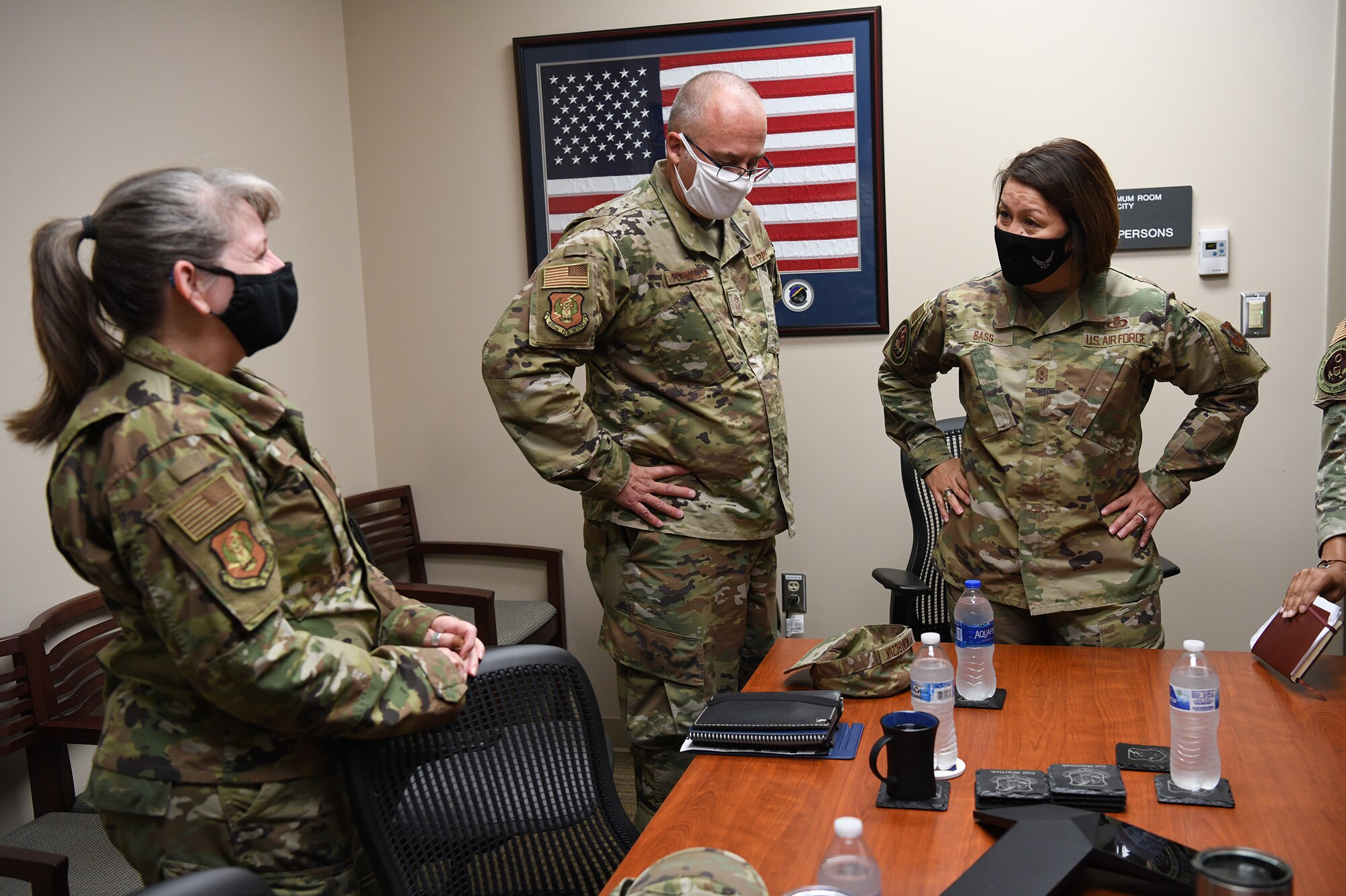 Chief Master Sgt. Bohdan Pywowarczuk, II, 655th Intelligence, Surveillance and Reconnaissance Wing command chief, and Chief Master Sgt. Jeannette Roman, 655th ISR Wing command chief liaison, give a 655th ISR Wing overview briefing to Chief Master Sgt. of the Air Force JoAnne Bass and her team Oct. 2, 2021. During her visit at the 655th, Bass participated in an enlisted call and coined their outstanding performer, Tech. Sgt. Jana Palant, 655th Intelligence, Surveillance and Reconnaissance Group NCO in charge of readiness and training.