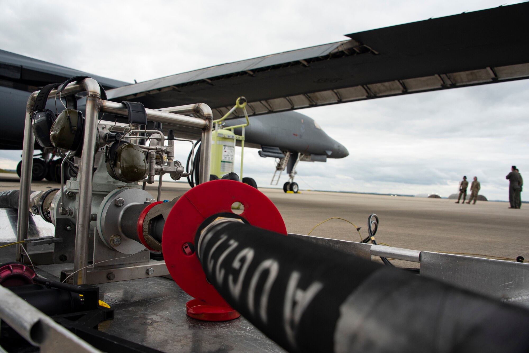 Two B-1B Lancers, from Dyess Air Force Base’s 9th Expeditionary Bomb Squadron currently operating from Royal Air Force Fairford, England, conduct hot pit refueling using the innovative Versatile Integrated Partner Equipment Refueling (VIPER) kit, at Spangdahlem Air Base, Germany, Oct. 11, 2021. This was in support of European Command’s Bomber task Force 22-1 mission support series using the VIPER kit, a hot pit refuel tool, supporting Agile Combat Employment operations. (U.S. Air Force photo by Staff Sgt. Chance Nardone)