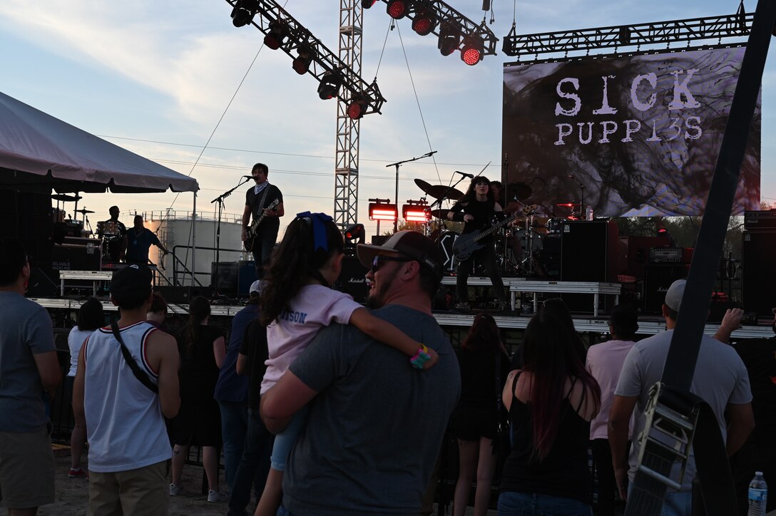 Sick Puppies, 3OH3!, and Brett Scallions performing for members of Laughlin Air Force Base, Texas on Oct. 8, 2021. This concert was put on to support the members of Team XL that help make the mission a success every day. (U.S. Air Force photo by Senior Airman David Phaff)