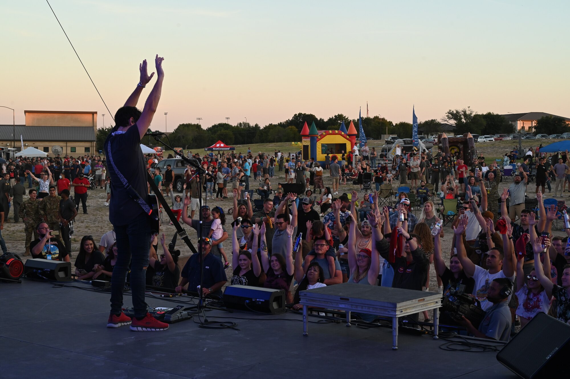 Sick Puppies, 3OH3!, and Brett Scallions performing for members of Laughlin Air Force Base, Texas on Oct. 8, 2021. This concert was put on to support the members of Team XL that help make the mission a success every day. (U.S. Air Force photo by Senior Airman David Phaff)