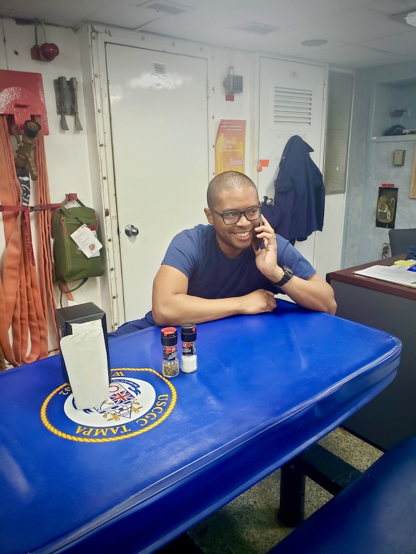 The crew aboard Cutter Tampa uses newly installed WiFi on the mess deck on Sept. 21, 2021. The cutter crew conducted a Caribbean patrol to combat illicit activity and protect the safety of life at sea. (U.S. Coast Guard photo)