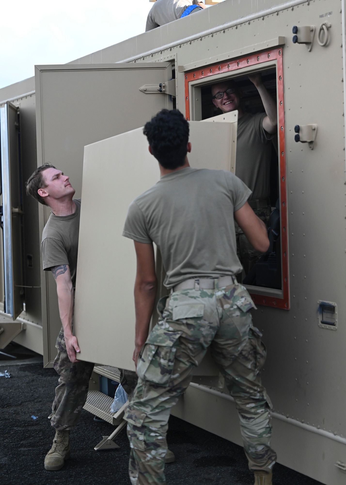 Exercise Agile Combat Employment Reaper Airmen put together a ground control station, Sept. 11, 2021, on Marine Corps Base Hawaii. The GCS was assembled and operational within 24 hours, demonstrating the unique capability and flexibility of the MQ-9 Reaper. (U.S. Air Force photo by Airman 1st Class Adrian Salazar)