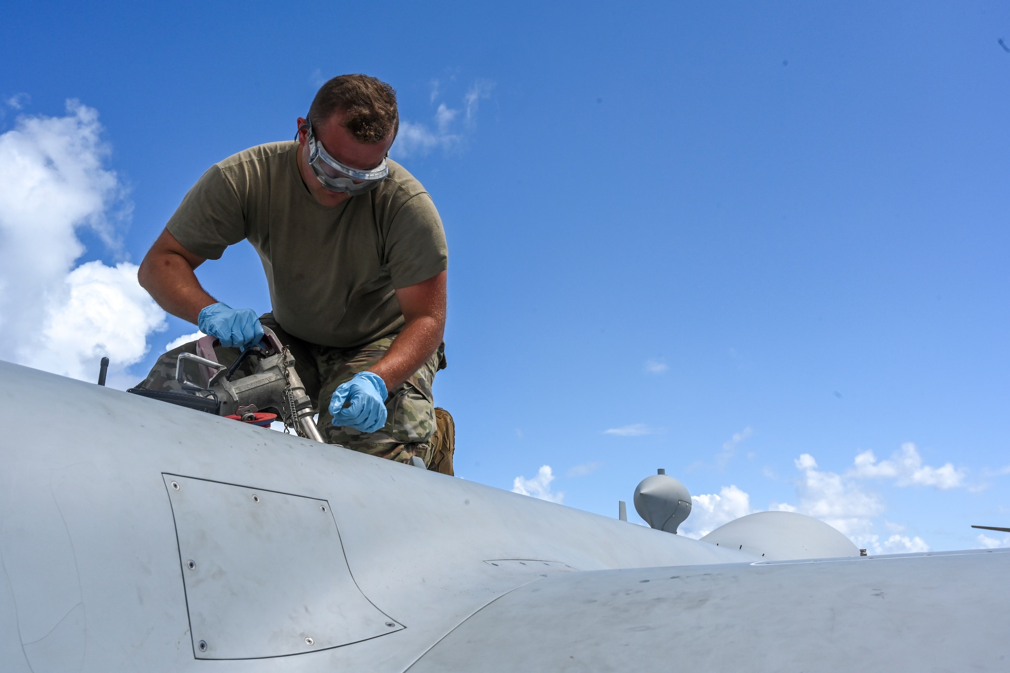 Col. Nicholas Pederson, 49th Wing vice wing commander (left), and Maj. Adam Smith, 16th Training Squadron director of MQ-9 Reaper rapid response operations, walk to the ground control station, Sept. 13, 2021, on Marine Corps Base Hawaii. Pederson visited MCBH to view the operations and how personnel integrated from different platforms - in an effort to continue defense and security of our nation. (U.S. Air Force photo by Airman 1st Class Adrian Salazar)