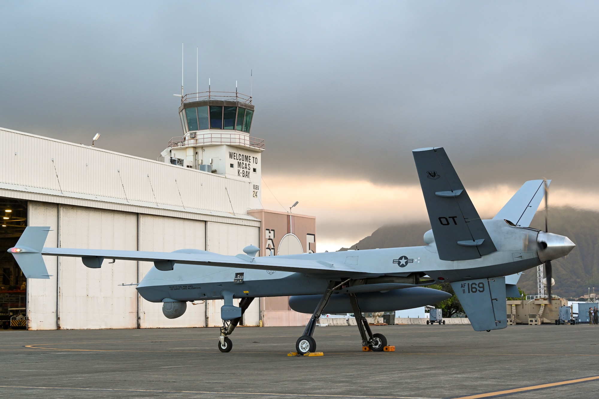 An MQ-9 Reaper from Creech Air Force Base, Nevada, sits on the flightline during Exercise Agile Combat Employment Reaper Sept. 13, 2021, on Marine Corps Base Hawaii. Agile combat employment leverages interoperability between the joint forces to maintain the strategic initiative, present lethal credible combat power with operational unpredictability and ultimately win. (U.S. Air Force Photo by Airman 1st Class Adrian Salazar)