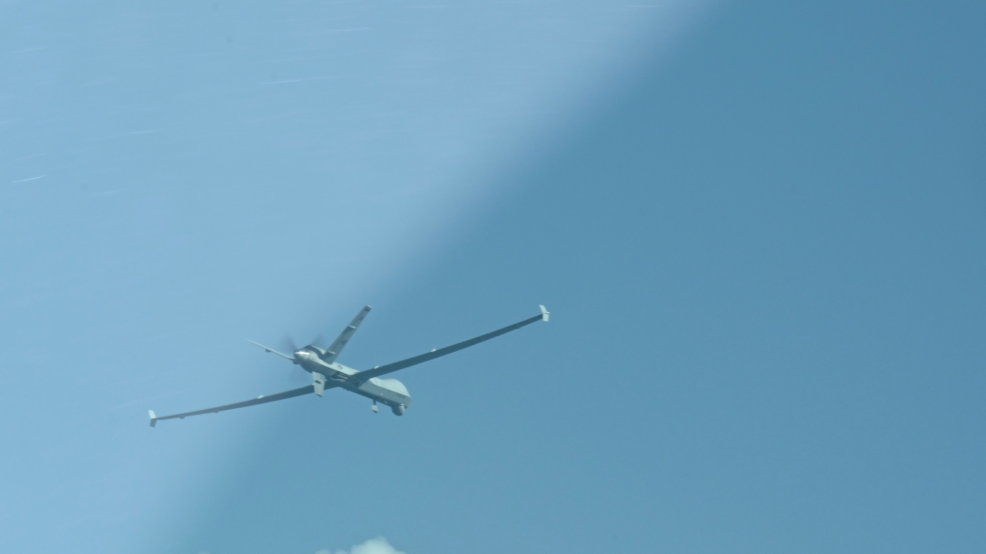 An MQ-9 Reaper at Exercise Agile Combat Employment Reaper flies a local sortie, Sept. 20, 2021, Marine Corps Base Hawaii. The purpose of this exercise is to demonstrate the MQ-9 assets and our Airmen’s ability to rapidly mobilize and integrate across multiple domains. (U.S. Air Force photo by Airman 1st Class Adrian Salazar)