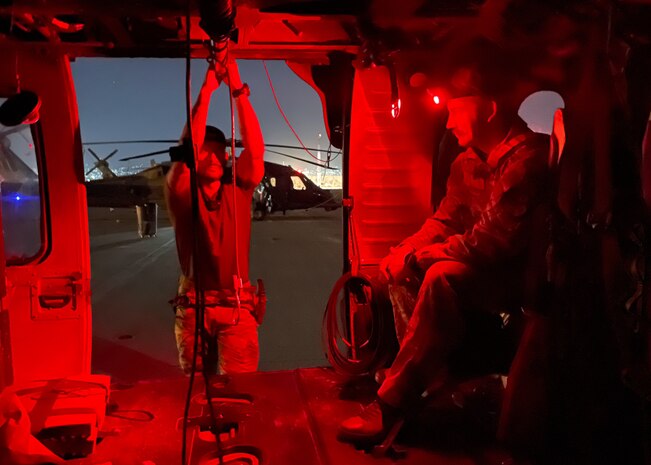 Airmen at work at night