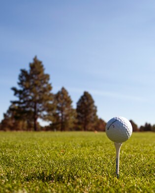 Golf ball on a tee