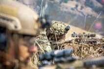 U.S. Marine Corps Lance Cpl. Marcos J. Romeroflores, a rifleman with 3rd Battalion, 1st Marine Regiment, 1st Marine Division, suppresses a target during the Super Squad 21 competition on Range 800 at Marine Corps Base Camp Pendleton, California, Aug. 24, 2021. The week-long Super Squad competition tests infantry squads in a variety of combat related skills and determines the most effective squad in the division. (U.S. Marine Corps photo by Lance Cpl. Quince Bisard)