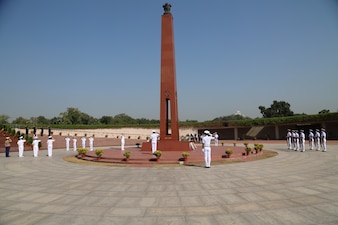 NEW DELHI (Oct. 12, 2021) Service Members from the U.S. and Republic of India take place in a wreath laying ceremony at the National War Memorial in New Delhi. Among the participants was Chief of Naval Operations (CNO) Adm. Mike Gilday, who is visiting India to meet with India Chief of Naval Staff Admiral Karambir Singh and other senior leaders from the Indian Navy and government. (Photo courtesy of U.S. State Department/Released)