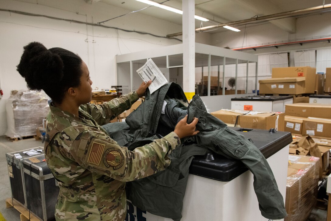 Airman inspects DRMO equipment.