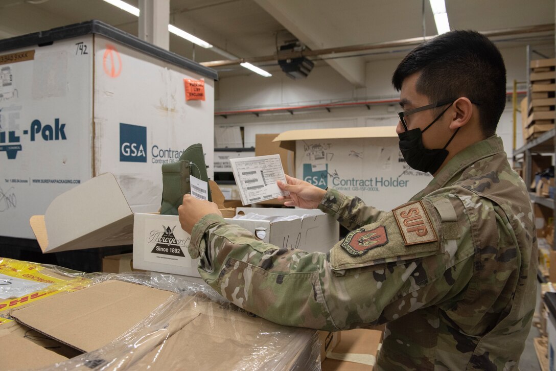 Airman inspects DRMO items.