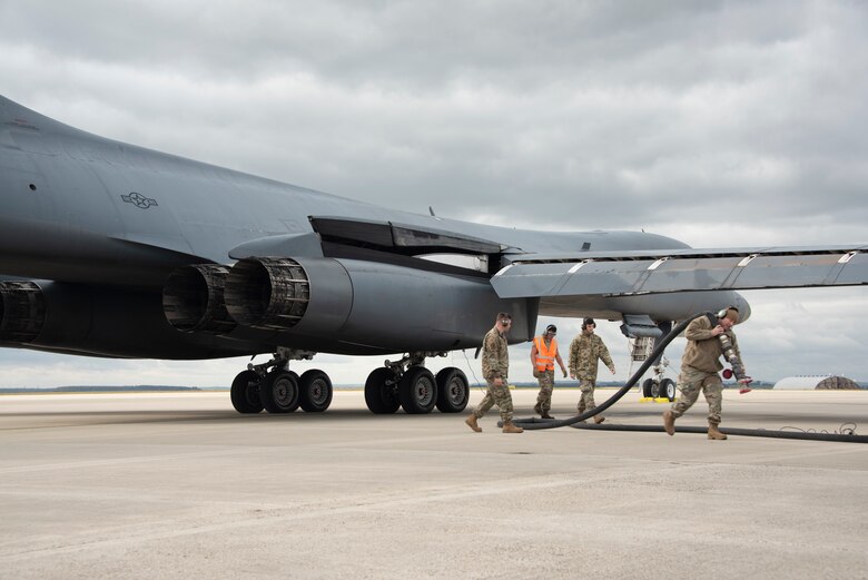 Two B-1B Lancers, from Dyess Air Force Base’s 9th Expeditionary Bomb Squadron currently operating from Royal Air Force Fairford, England, conduct hot-pit refueling using the innovative Versatile Integrated Partner Equipment Refueling (VIPER) kit, at Spangdahlem Air Base, Germany, Oct. 11, 2021. This was in support of European Command’s Bomber Task Force 22-1 mission support series using the VIPER kit, a hot-pit refuel tool supporting Agile Combat Employment operations.