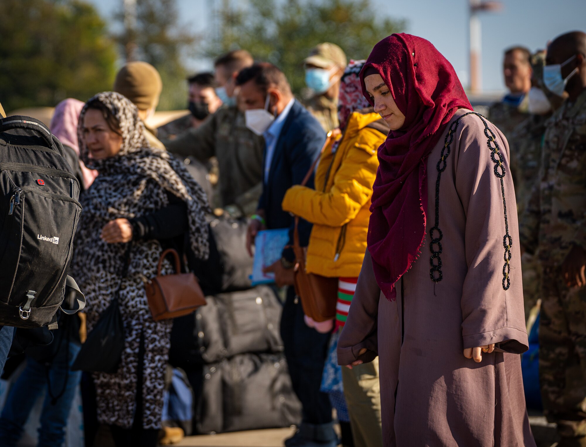 Evacuees move towards passenger terminal.