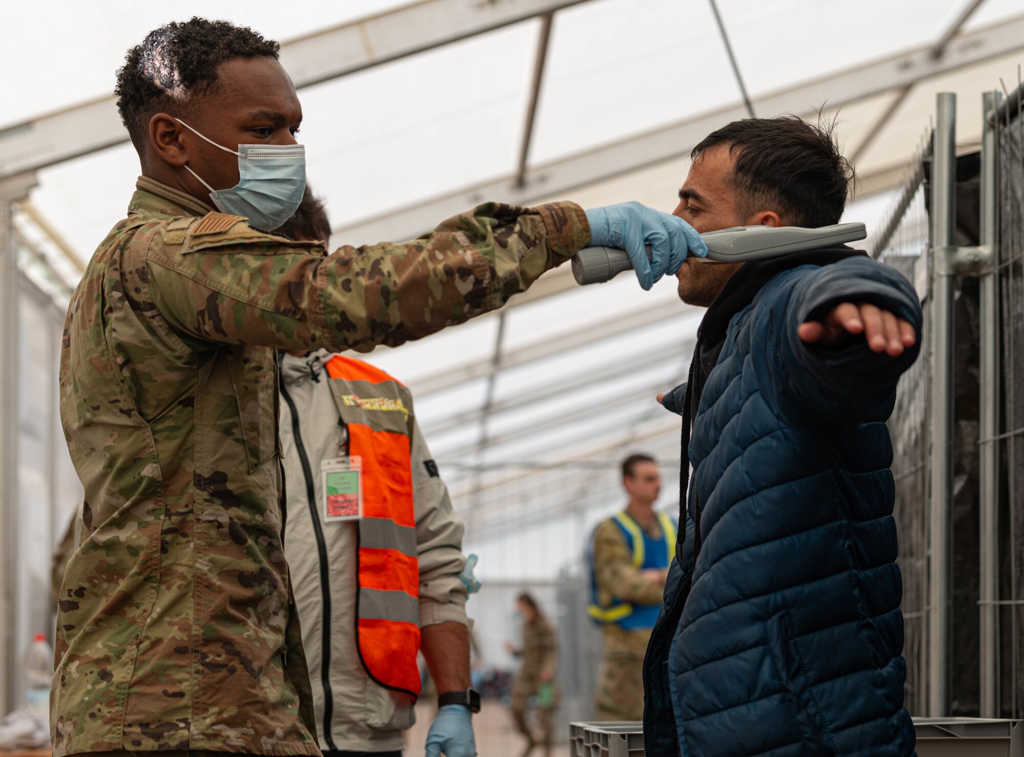 Airman performs security check.