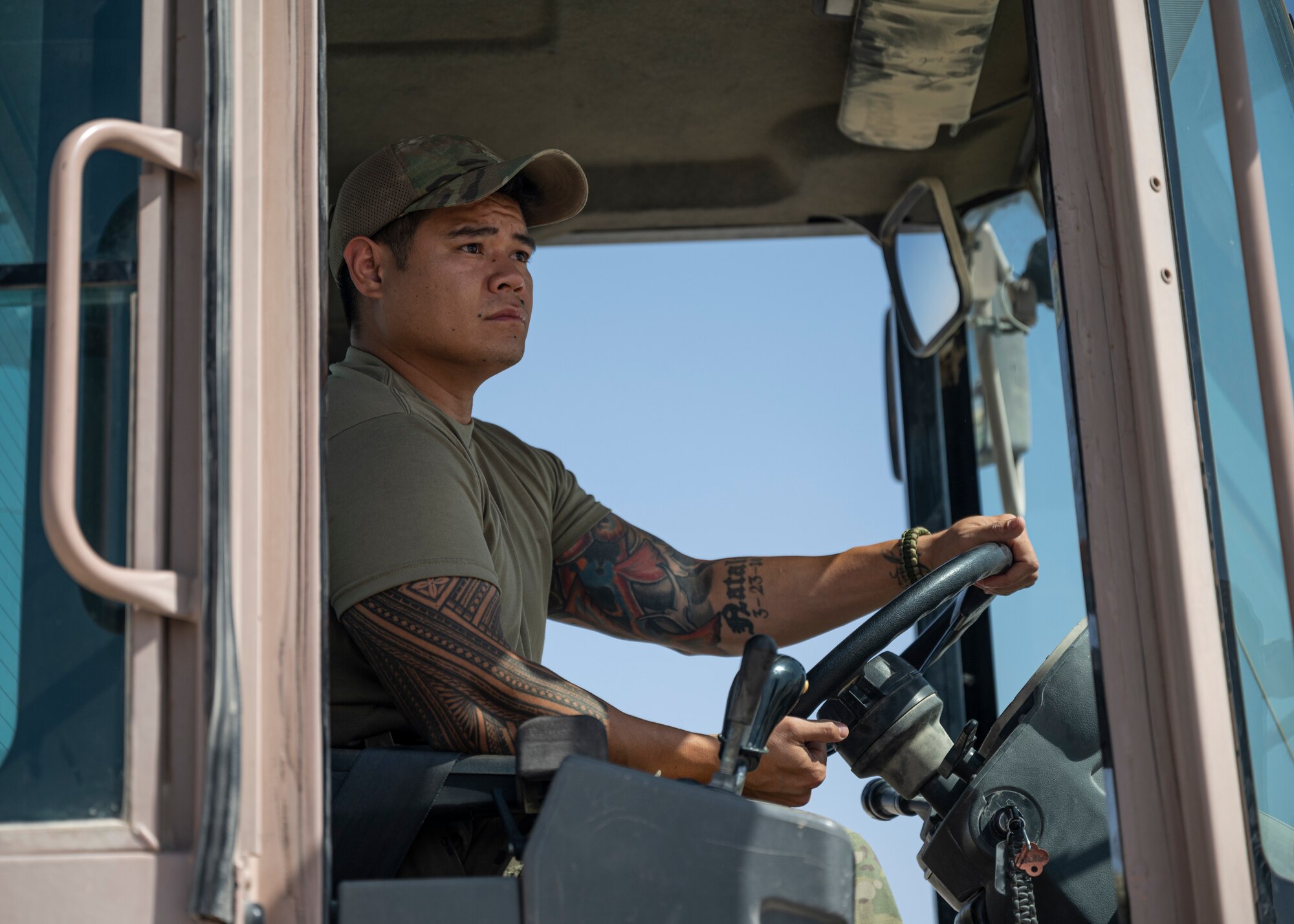 U.S. Air Force Staff Sgt. Robert Ignacio, assigned to the 443rd Air Expeditionary Squadron, moves cargo at Al Asad Air Base, Iraq, Sept. 22, 2021.