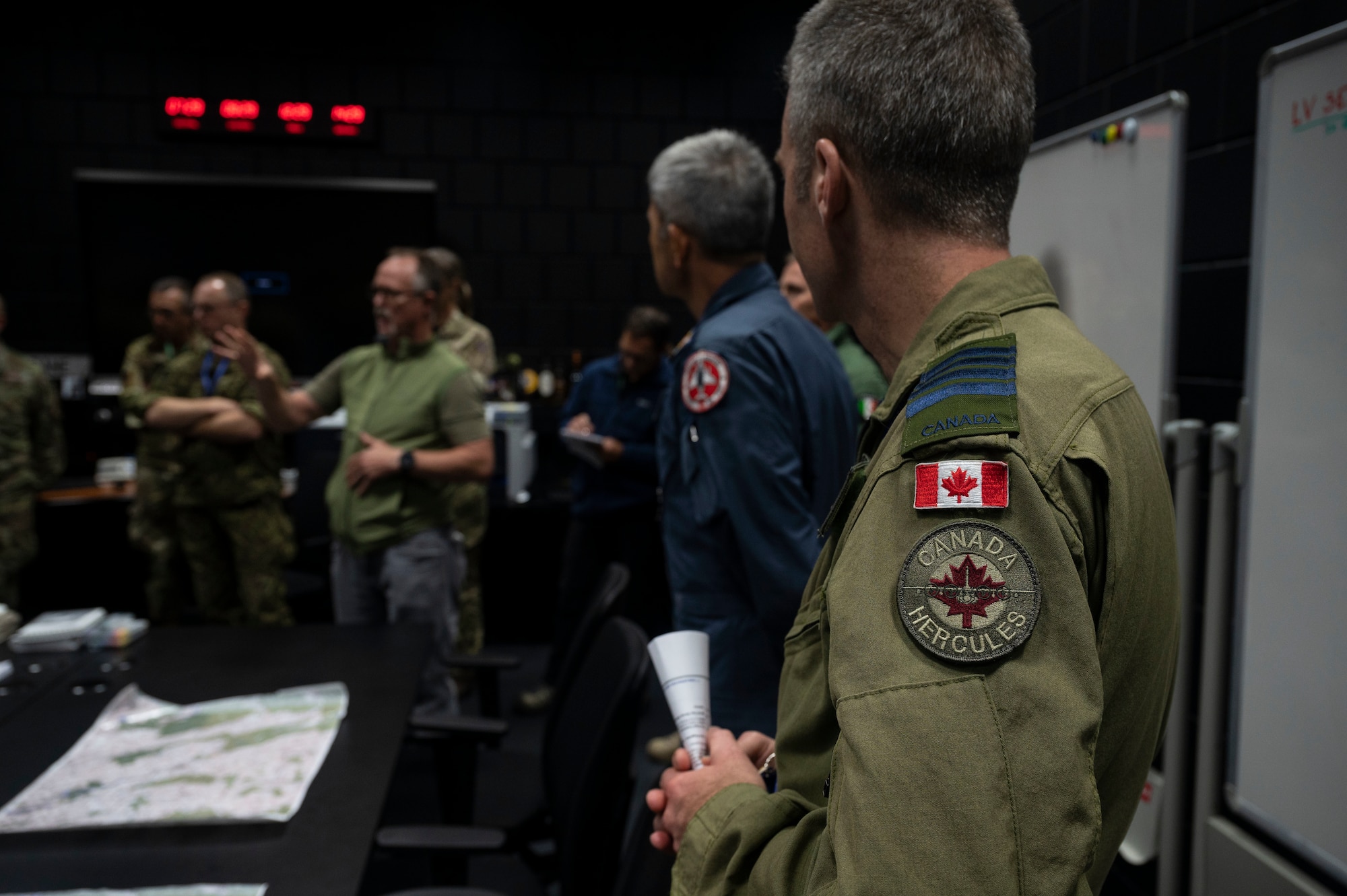 North Atlantic Treaty Organization distinguished visitors listen to a briefing at U.S. Air Force Europe- Air Forces Africa’s Warrior Preparation Center during exercise Spartan Bigfoot 21 at Einsiedlerhof Air Station, Germany