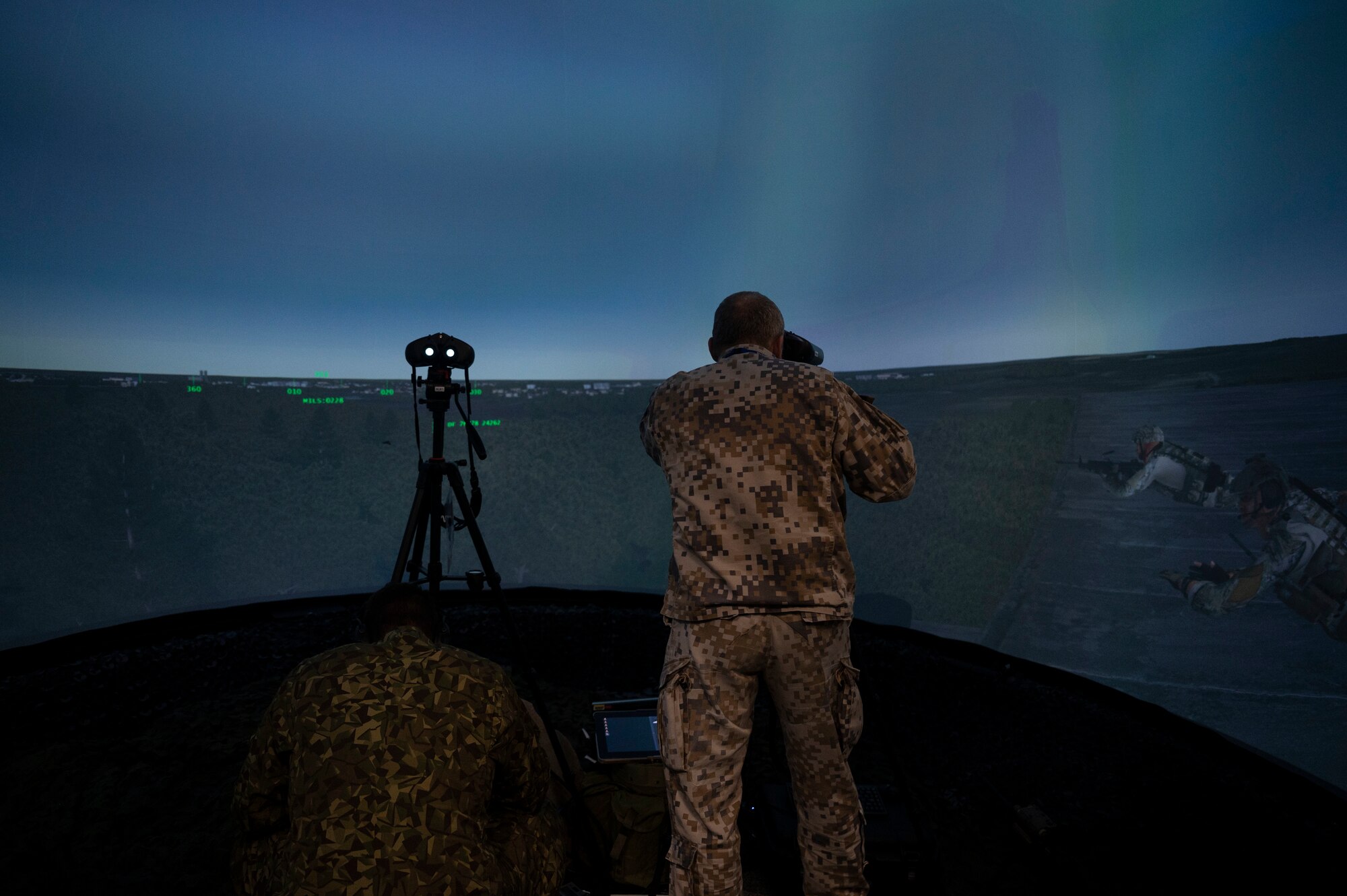 Two Latvian joint terminal attack controllers simulate JTAC operations in the U.S. Air Force Europe- Air Forces Africa’s Warrior Preparation Center’s virtual simulator during exercise Spartan Bigfoot 21 at Einsiedlerhof Air Station