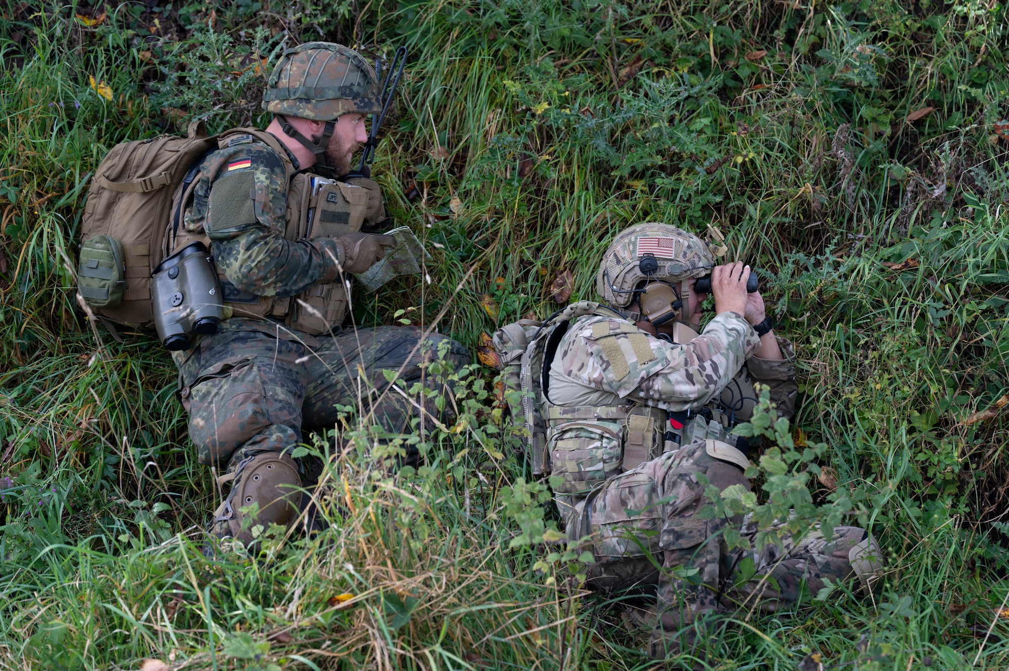 A German joint terminal attack controller, left, and a U.S. Air Force JTAC participate in exercise Spartan Bigfoot 21 at U.S. Army Garrison Baumholder