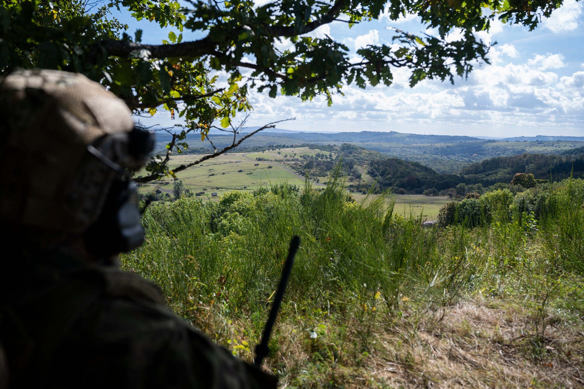 A Latvian joint terminal attack controller conducts overwatch during exercise Spartan Bigfoot 21 at U.S. Army Garrison Baumholder,