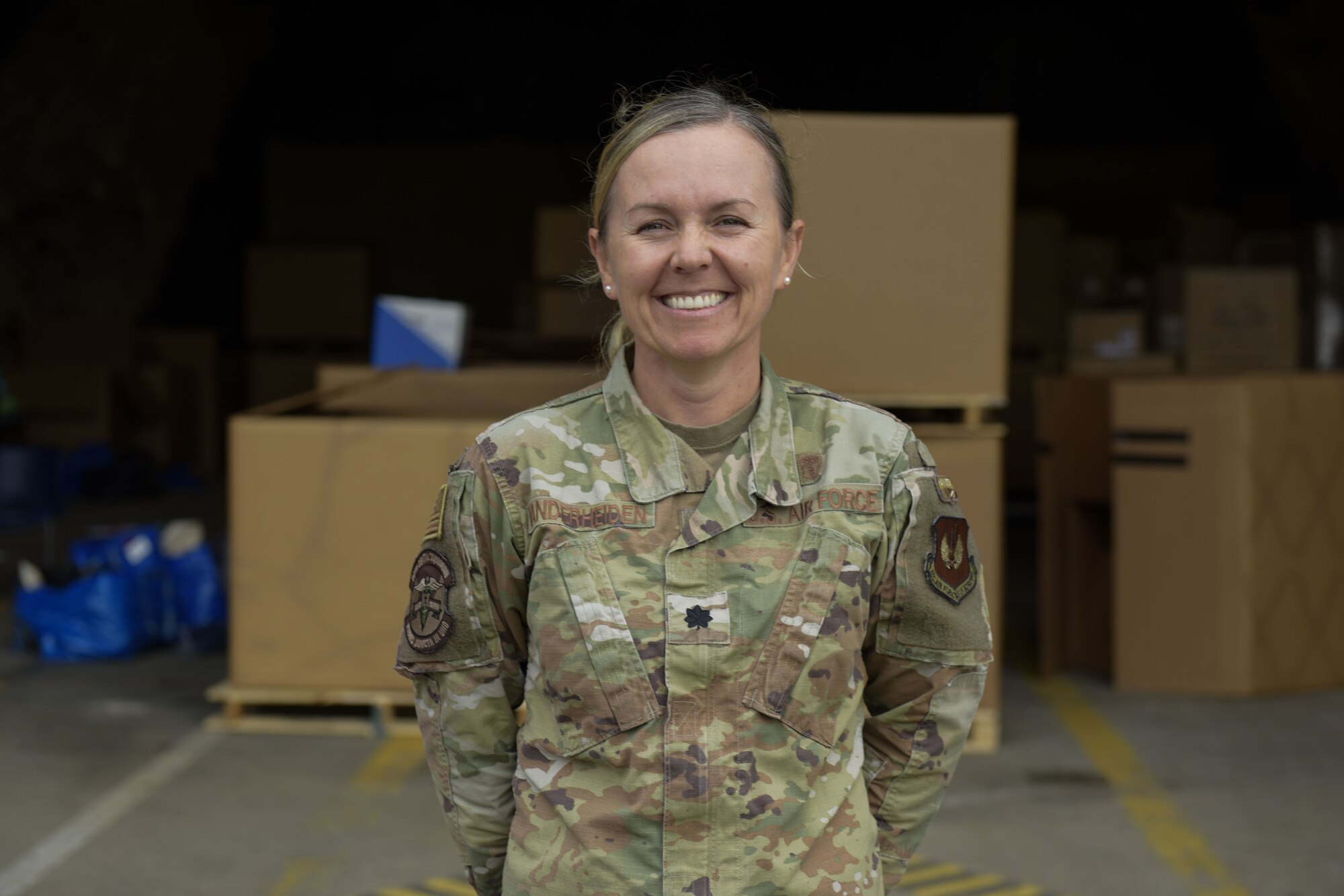 Lt. Col. Vanderheiden stands outside