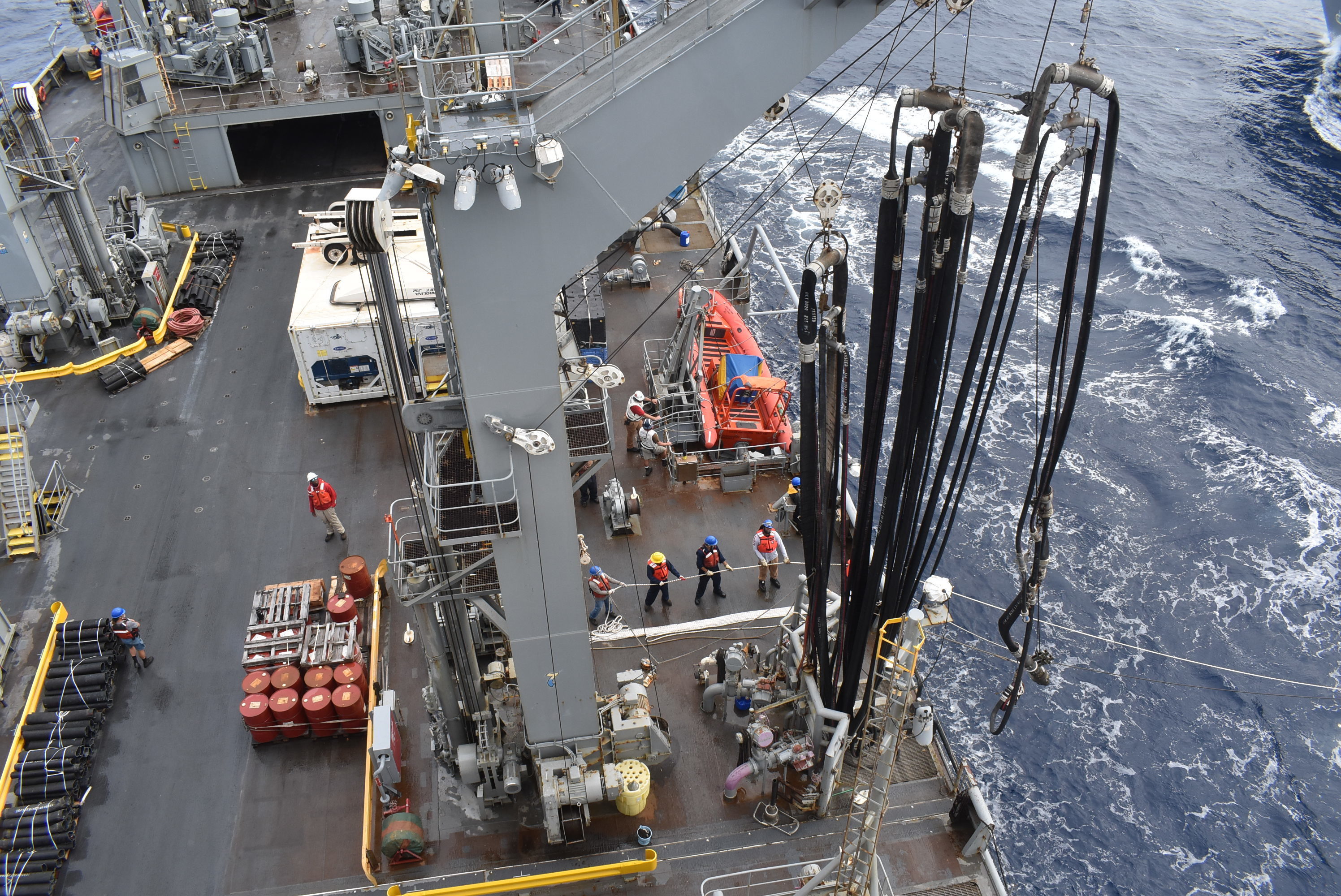 USNS Big Horn (T-AO 198) prepares for an underway replenishment, providing fuel and other critical supplies, with Royal Australian Navy Anzac-class frigate HMAS Warramunga (FFH 152) and Hobart-class destroyer HMAS Brisbane (DDG 41), Oct. 11.