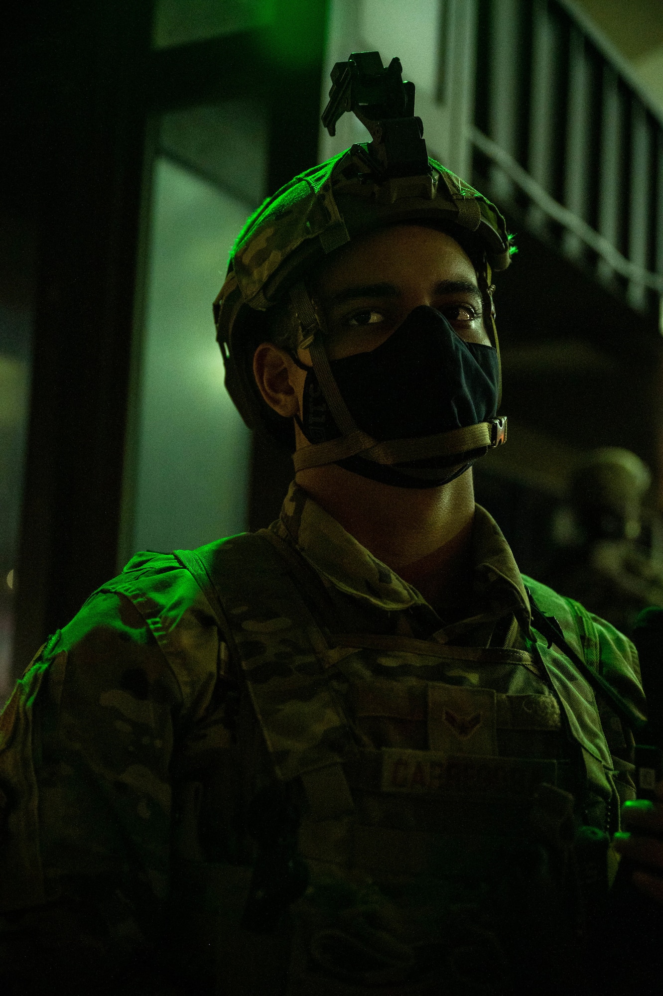 Airman 1st Class David Carregosa, 436th Security Forces Squadron response force member, stands guard at the main gate during a Force Protection Major Accident Exercise at Dover Air Force Base, Delaware, Oct. 7, 2021. The three-day exercise tested the response capabilities of Team Dover through various scenarios in an effort to strengthen their ability to provide rapid global mobility in challenging conditions. (U.S. Air Force photo by Senior Airman Faith Schaefer)