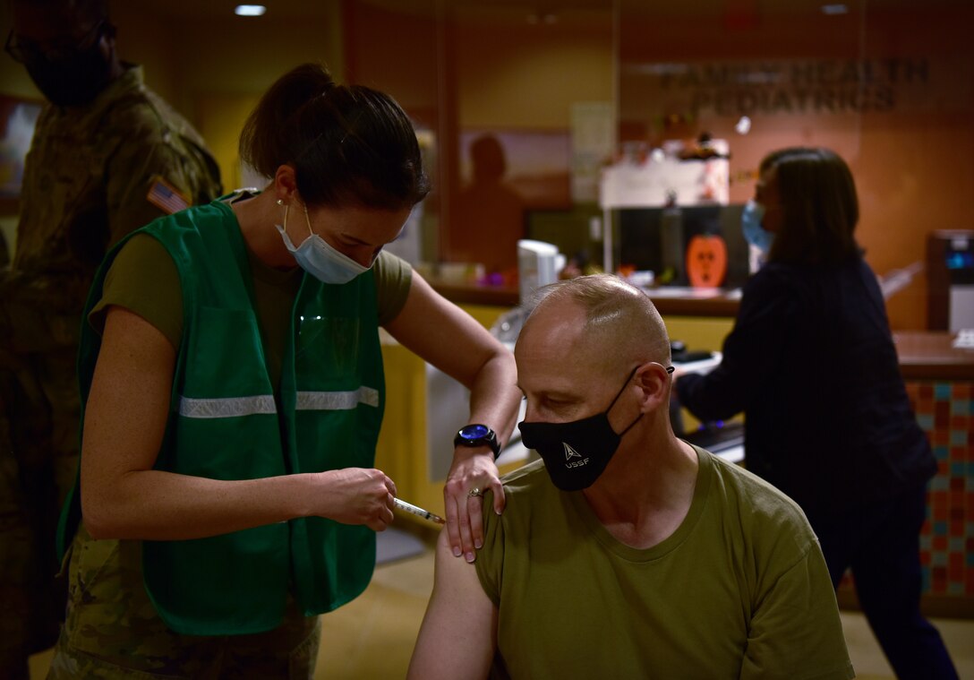 Lt. Gen. Michael Guetlein, Space Systems Command’s first commander, receives his flu shot during his visit to the 30th Medical Group on Oct. 6, 2021, at Vandenberg Space Force Base, Calif. (U.S. Space Force photo by Airman First Class Tiarra Sibley)