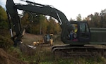 Students from the Center for Technology Essex operate heavy equipment under supervision from Vermont National Guard Soldiers during a visit to the Camp Ethan Allen Training Site in Jericho, Vermont, on Oct. 12, 2021. (U.S. Army National Guard photo by Don Branum)