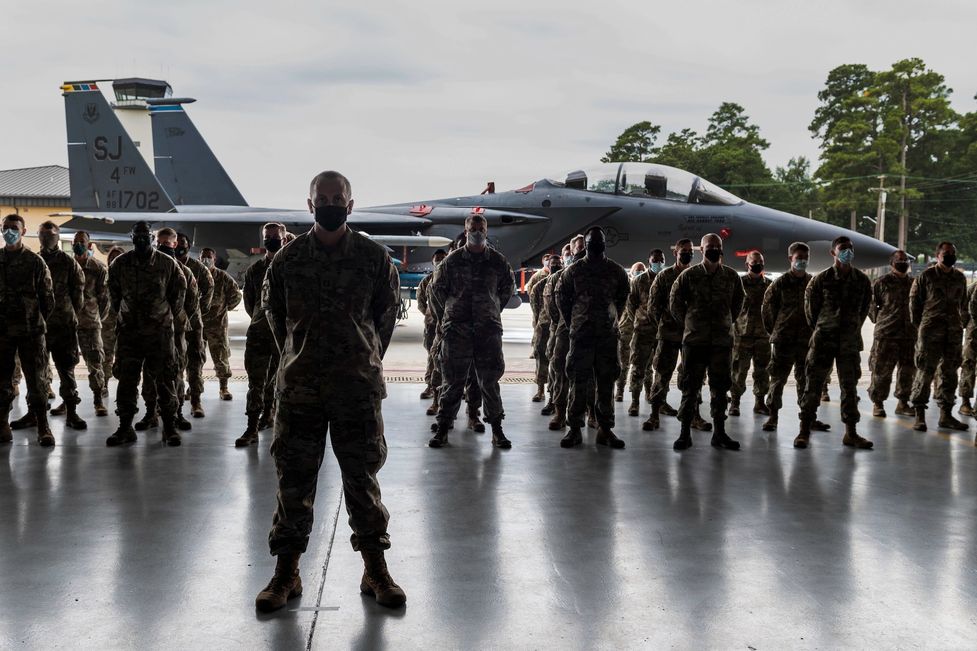 Airmen stand in formation during the Fighter Generation Squadron activation and assumption of command ceremony at Seymour Johnson Air Force Base, North Carolina, Sept 29, 2021.