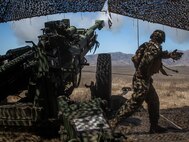 A U.S. Marine with Alpha Battery, 1st Battalion, 11th Marine Regiment, 1st Marine Division, fires a M777 towed 155 mm howitzer during the Fall Fire Exercise (FIREX) aboard Marine Corps Base Camp Pendleton, California, Sept. 10, 2021. FIREX is a regimental-level exercise designed to allow multiple batteries to train together in preparation for Steel Knight, an annual combat readiness exercise. (U.S. Marine Corps photo by Sgt. Matthew Kirk)