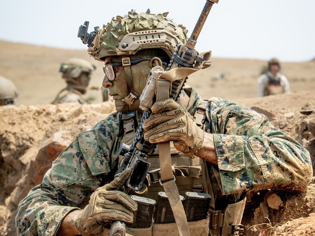 U.S. Marine Corps Lance Cpl. Marcos J. Romeroflores, a rifleman with 3rd Battalion, 1st Marine Regiment, 1st Marine Division, transitions his position during the Super Squad 21 competition on Range 800 at Marine Corps Base Camp Pendleton, California, Aug. 24, 2021. The week-long Super Squad competition tests infantry squads in a variety of combat related skills and determines the most effective squad in the division. (U.S. Marine Corps photo by Lance Cpl. Quince Bisard)