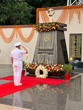VISAKHAPATNAM, India (Oct. 13, 2021) Chief of Naval Operations (CNO) Adm. Mike Gilday, salutes during a visit to the lost-at-sea memorial at the Indian Eastern Naval Command Headquarters. Gilday is in India to meet with India Chief of Naval Staff Admiral Karambir Singh and other senior leaders from the Indian Navy and government.  (U.S. Navy photo by Cmdr. Nate Christensen/Released)