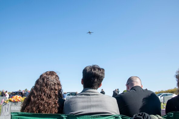 The family of U.S. Army Air Forces 2nd Lt. Ernest Vienneau, former 97th Bombardment Group (BG) pilot, watches as a KC-46 Pegasus from the 97th Air Mobility Wing (AMW) approaches in the distance at Millinocket, Maine, Oct. 9, 2021. The 97th BG at the time of Vienneau’s service was in Amendola, Italy, and has since changed its name and location to the 97th AMW in Altus, Oklahoma. (U.S. Air Force photo by Staff Sgt. Cody Dowell)