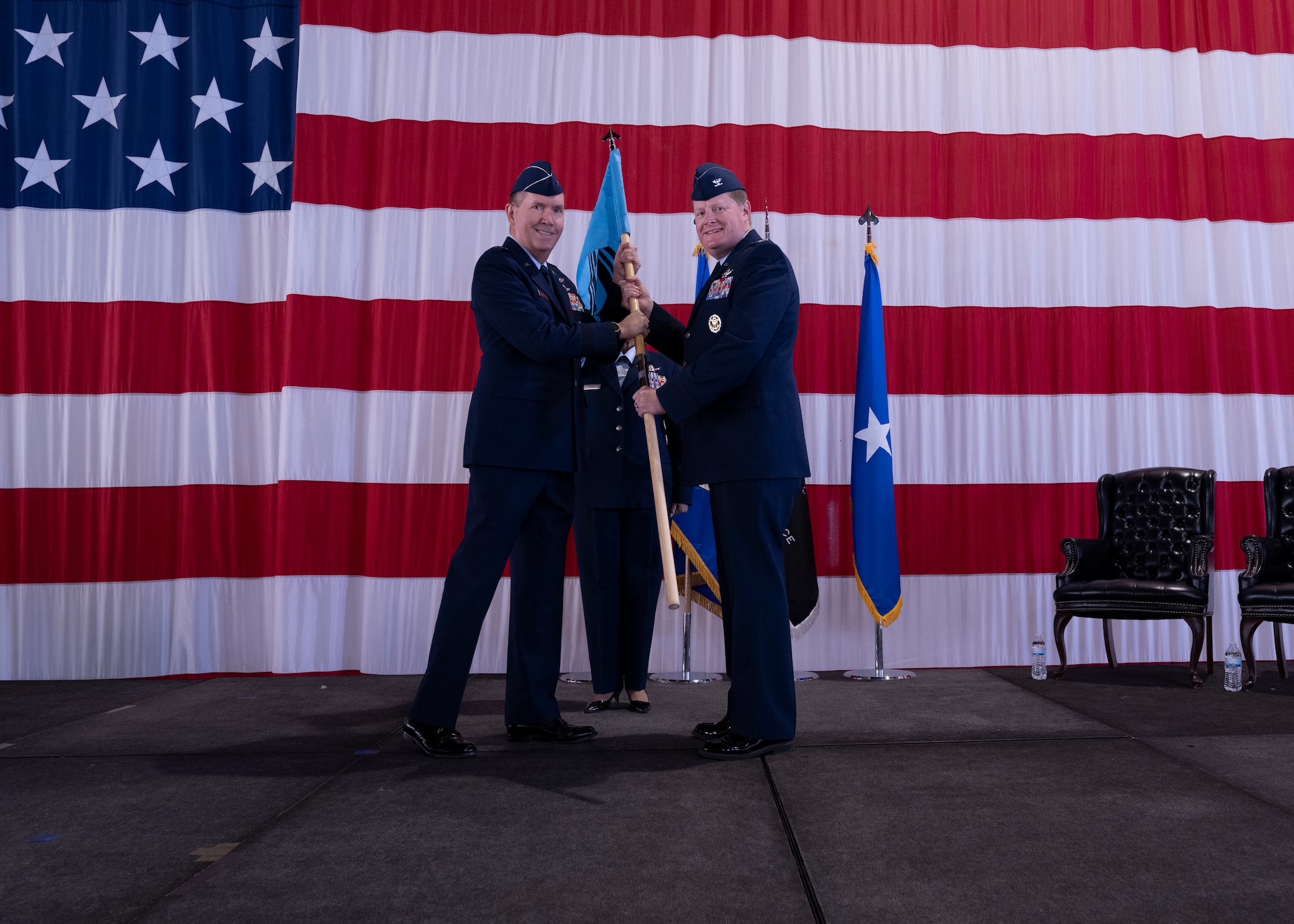 PETERSON SPACE FORCE BASE, Colo. – U.S. Space Force Brig. Gen. Shawn Bratton, Space Training and Readiness Command commander, passes the Space Delta 10 – Doctrine and Wargaming guidon to U.S. Space Force Col. Jack D. Fulmer II, DEL 10 commander, during the activation ceremony at Peterson Space Force Base, Colorado, Sept. 30, 2021. DEL 10 is temporarily located at the United States Air Force Academy until the completion of the Department of the Air Force’s Strategic Basing Process is completed and approved by the Secretary of the Air Force. (U.S. Space Force photo by Staff Sgt. Matthew Coleman-Foster)