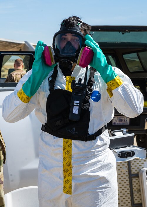 An Emergency Management Airman dons his PPE during a "Broken Arrow" training exercise on Edwards Air Force Base, California, Sept. 28. (Air Force photo by Katherine Franco)