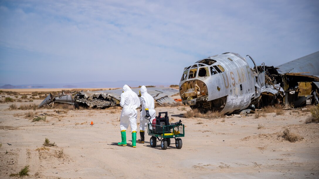 412th Medical Group Bioenvironmental Engineering Airmen pull their equipment into position during a "Broken Arrow" training exercise on Edwards Air Force Base, California, Sept. 28. (Air Force photo by Giancarlo Casem)